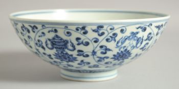A CHINESE BLUE AND WHITE PORCELAIN BOWL, with lotus and eight treasure pattern to the exterior,
