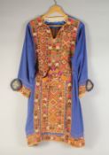 AN EMBROIDERED AFGHAN OR CENTRAL ASIAN DRESS.