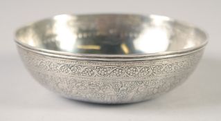 A PERSIAN FINELY ENGRAVED SILVER BOWL, with a band of figures and foliate motifs, weight 80g, 11cm