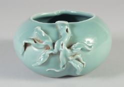 A CHINESE CELADON GLAZED PEACH FORM PORCELAIN WATERPOT, the base with an underglaze moulded Qianlong