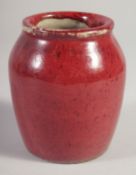 A CHINESE FLAMBE GLAZE BRUSH POT, 10cm high.