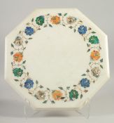 AN INLAID MARBLE OCTAGONAL TABLE TOP, inlaid with abalone, malachite, lapis lazuli and carnelion,