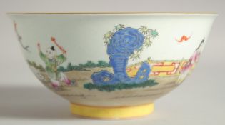 A CHINESE FAMILLE ROSE AND TURQUOISE GLAZE BOWL, decorated with children, six-character mark to