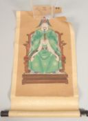 A 19TH CENTURY CHINESE SCROLL PAINTING ON PAPER, depicting a seated dignitary.