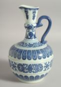 A CHINESE BLUE AND WHITE PORCELAIN EWER, with floral motifs, the base with character mark, 21cm