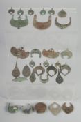 A RARE COLLECTION OF THIRTY 12TH-13TH CENTURY PERSIAN SELJUK BRONZE PENDANTS and other jewellery