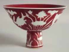 A CHINESE COPPER RED AND WHITE PORCELAIN PEDESTAL BOWL, with fish and aquatic flora, bowl 17cm