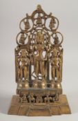 A BUDDHISTIC FIGURAL BRONZE, characters to the reverse, 28cm high.