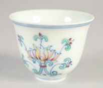 A CHINESE DOUCAI PORCELAIN CUP, with six-character mark, 6.5cm diameter.