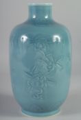 A CHINESE POWDER BLUE CARVED FLOWER VASE, six-character mark to base, 28cm high.