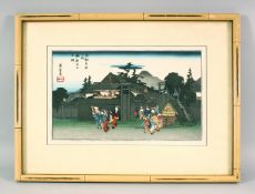 A JAPANESE WOODBLOCK PRINT, depicting figures aside mountains and temples, signed and sealed upper