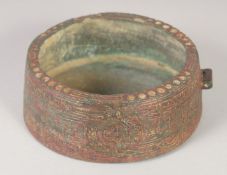 A 10TH-11TH CENTURY PERSIAN GHAZNAVID BRONZE BOWL, with Kufic calligraphy, 13cm diameter.
