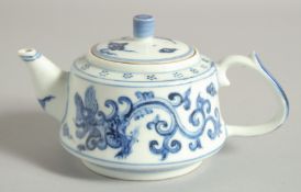 A CHINESE BLUE AND WHITE PORCELAIN TEAPOT, with 'kui dragon' decoration, 15.5cm spout to handle.