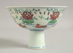 A CHINESE DOUCAI PORCELAIN PEDESTAL BOWL, decorated with ducks and floral motifs, bowl 15.5cm