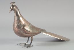 A WHITE METAL MODEL OF A PEACOCK, with engraved details, 37cm long.