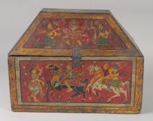 A FINE AND LARGE 19TH CENTURY SOUTH INDIAN PAINTED WOODEN CASKET, decorated with deities and