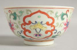 A 19TH CENTURY CHINESE POLYCHROME PORCELAIN BOWL, with six-character mark to base, 11.5cm diameter.