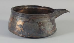 A VERY FINE 15TH CENTURY MAMLUK COPPER SPOUTED BOWL, engraved with calligraphy and cup symbols,