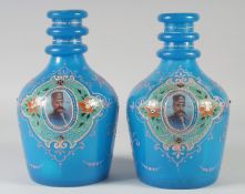 A SUPERB PAIR OF BOHEMIAN GLASS ENAMELLED BOTTLES, with portrait of Muzaffar Aldin Shah, 26cm high.