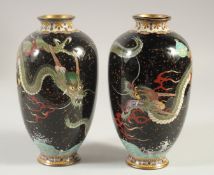 A PAIR OF CHINESE CLOISONNE DRAGON VASES, 18cm high.