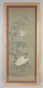 A 19TH CENTURY FRAMED JAPANESE SCROLL PAINTING ON SILK, depicting cranes - with two embroidered