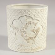 A CHINESE CARVED CYLINDRICAL BRUSH POT, with landscape panels, (faults), 15cm high.