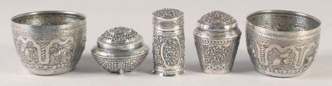 THREE EMBOSSED AND CHASED SILVER LIDDED BOXES, with floral decoration, combined weight 200g,
