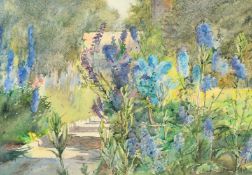 20th Century English School, a view of a garden in bloom, watercolour, indistinctly signed
