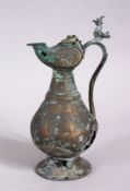 A 12TH CENTURY ISLAMIC PERSIAN BRONZE JUG, 15cm high.