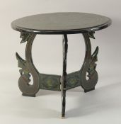 A THAI LACQUERED WOOD TABLE, 40cm high, 46cm diameter.