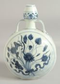 A CHINESE BLUE AND WHITE TWIN HANDLE MOON FLASK, with central floral spray, 30cm high.