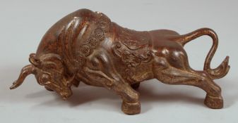 A CHINESE BRONZE FIGHTING BULL. 9.5ins long.
