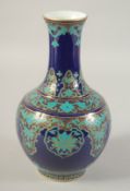 A SACRIFICIAL BLUE GROUND PORCELAIN VASE, with turquoise and gilt floral motifs, character mark to
