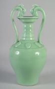 A CHINESE GREEN GLAZE TWIN HANDLE VASE, with zoomorphic handles and six-character mark to base, 35.