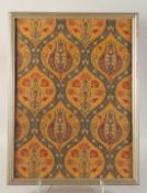 AN ISLAMIC/ORIENTAL FLORAL TEXTILE, framed and glazed, 54.5cm x 40cm.