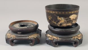 A LACQUER DRAGON BOWL, together with two hardwood stands, (3).