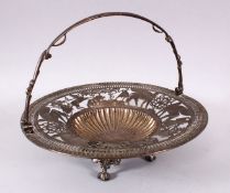 A 19TH CENTURY WHITE METAL OPEN WORK CASKET, with a folding handle, and openwork decoration of