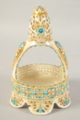 AN ISLAMIC ZSOLNAY OPENWORK PORCELAIN FORMED CASKET, with turquoise and gilded decoration, 20cm x