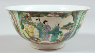 A CHINESE BOWL decorated with panels of figures. 6ins diameter.
