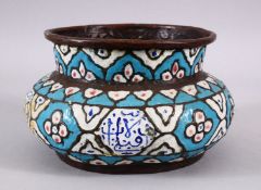 A 19TH CENTURY ISLAMIC TURKISH ENAMEL CALLIGRAPHIC BASIN, with a blue ground and panels of