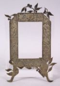 AN ISLAMIC PERSIAN STYLE WHITE METAL PICTURE FRAME, with decoration of ram, 19.5cm x 12cm.