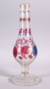 A 19TH CENTURY ISLAMIC TURKISH CUT GLASS HUQQA BASE, with floral decoration, 30cm high.