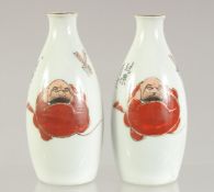 A PAIR OF JAPANESE PORCELAIN BOTTLES, 13cm high.