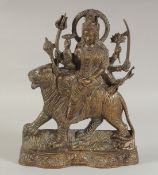 AN INDIAN BRASS RELIEF CAST PLAQUE, 30.5cm high.