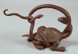 A CHINESE BRONZE SNAKE attacking a tortoise. 9.5ins long.