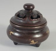 A SMALL CHINESE BRONZE GOLD SPLASH CIRCULAR CENSER AND COVER. 3.5ins diameter.