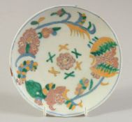 A SMALL TURKISH KUTAHYA DISH, 14cm diameter.