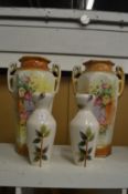 Two pairs of decorative vases.
