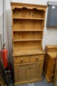 A narrow pine dresser.