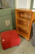 A pine bookcase and a footstool.
